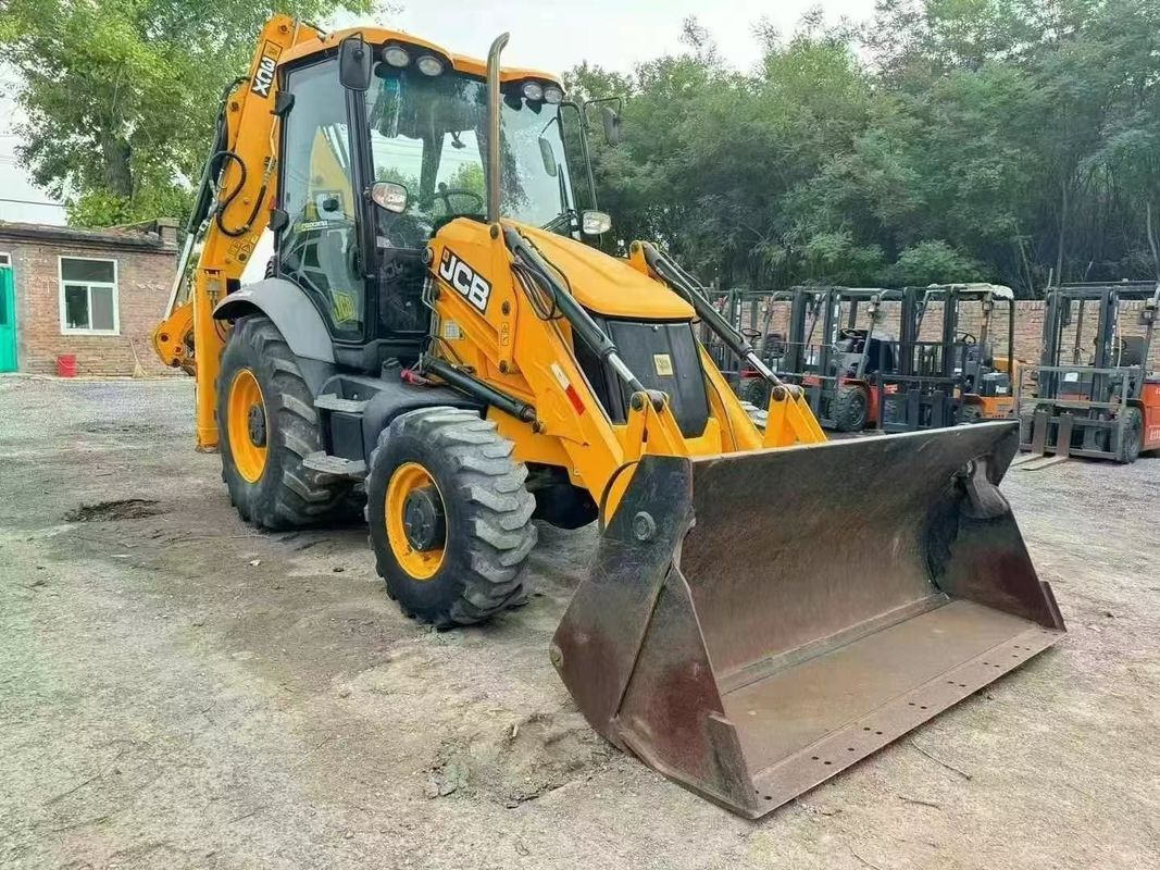 Использованный экскаватор JCB 3CX с разделенным ведровым расширителем