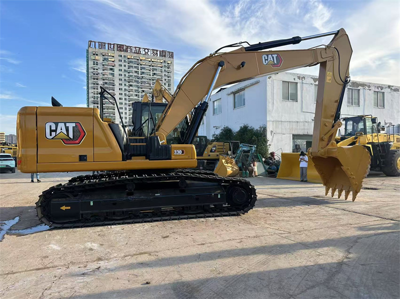 30-тонный подержанный экскаватор CAT 330. Новая модель гусеничного экскаватора Caterpillar 320 330